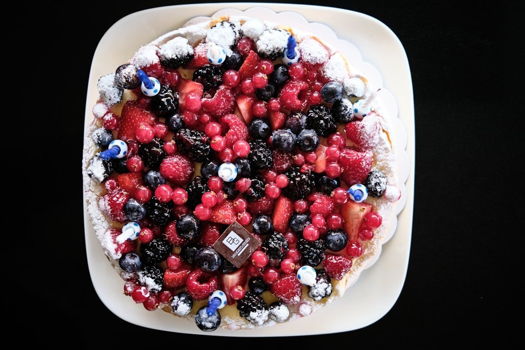 A close-up shot of a healthy bowl of oatmeal topped with berries, nuts, and seeds, emphasizing fiber-rich breakfast options.